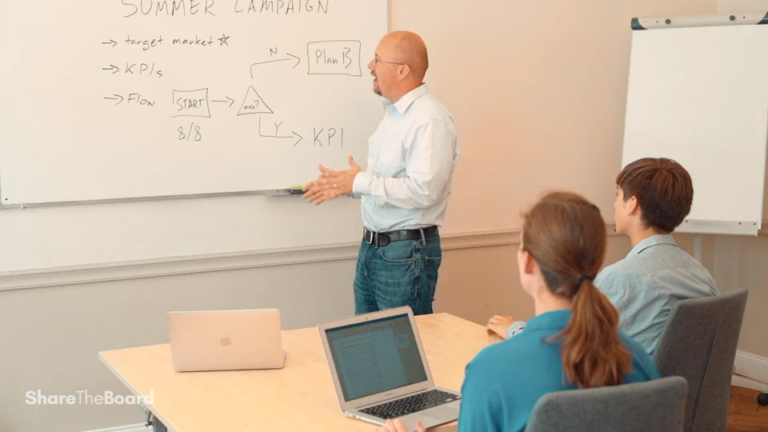 Photo of a conference room with people